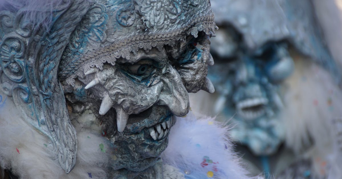 Close-up of elaborate carnival masks showcasing gothic and spooky elements, perfect for Halloween or masquerade themes.