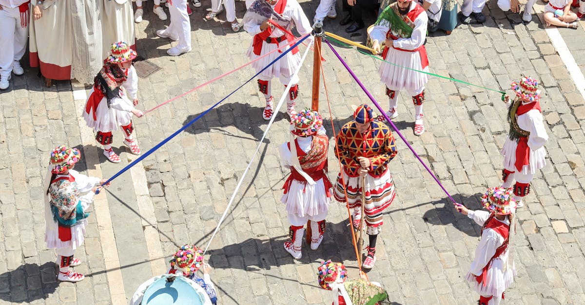 Colorful traditional dance with costumed performers at an outdoor festival.