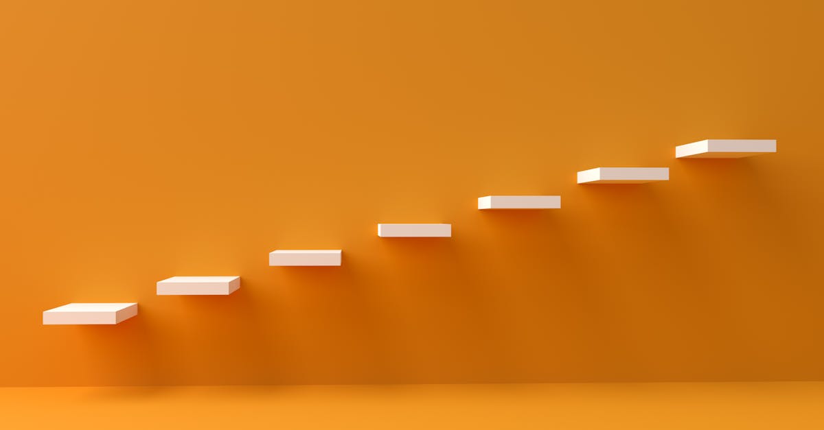 White floating steps on vibrant orange wall create a minimalist and conceptual design.