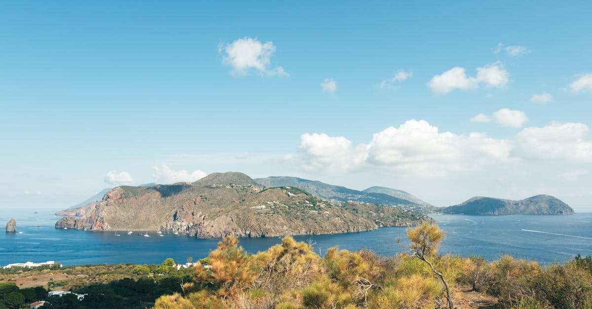 Beautiful panoramic view of Panarea Island with clear skies and calm sea in summer.