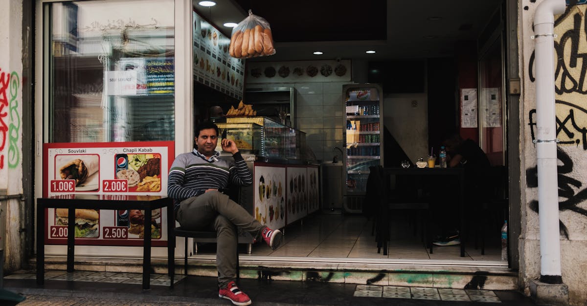 A casual urban diner with an inviting atmosphere and outdoor seating, showcasing street life.