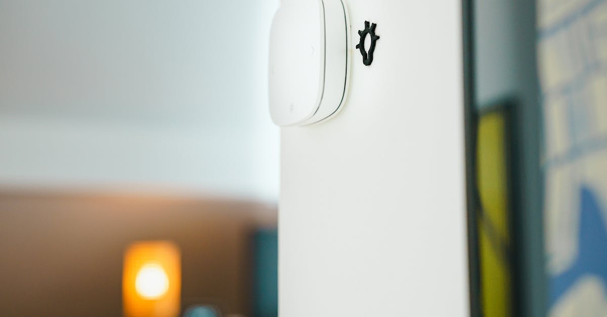 A sleek smart home light switch installed on a wall, showcasing modern technology in living spaces.