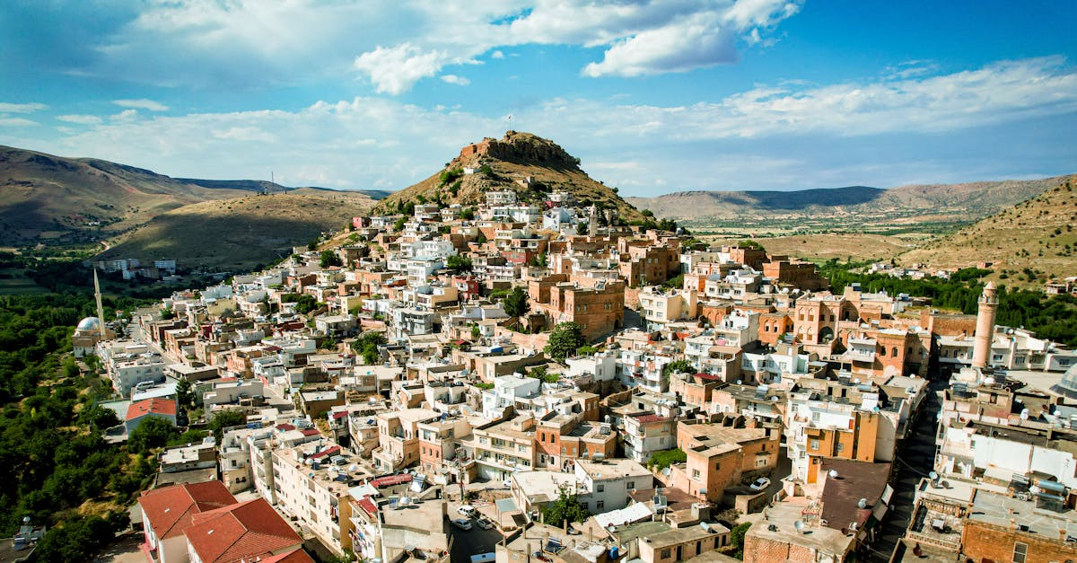 Stunning aerial view of the hillside town of Savur, showcasing traditional architecture.