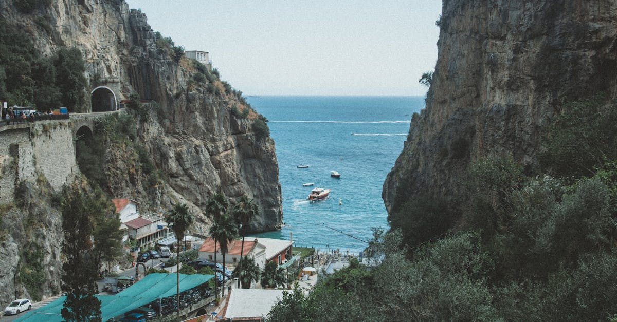Explore the breathtaking cliffs and azure waters of Furore Beach Bay in Campania, Italy.