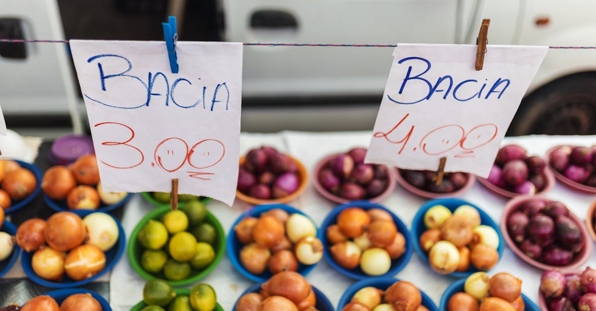 Colorful assortment of fruits and vegetables on display at a vibrant market stall.