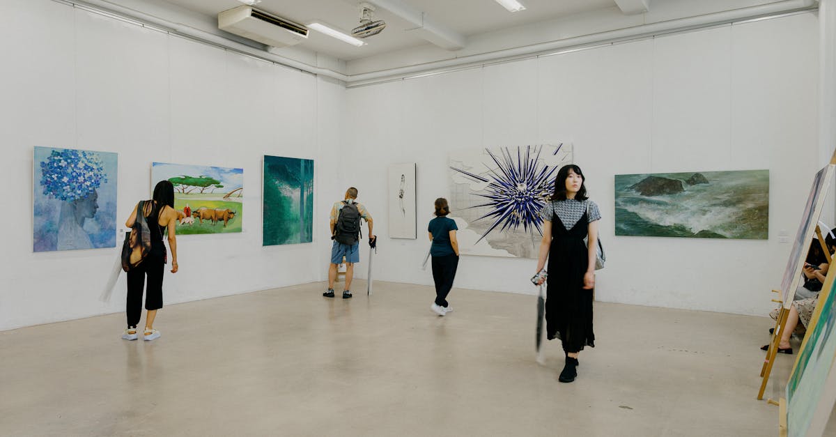 Explore diverse artworks in a contemporary Tokyo gallery setting.