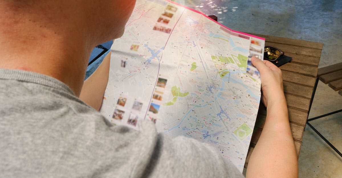 Traveler studying a map for directions, symbolizing exploration and adventure.