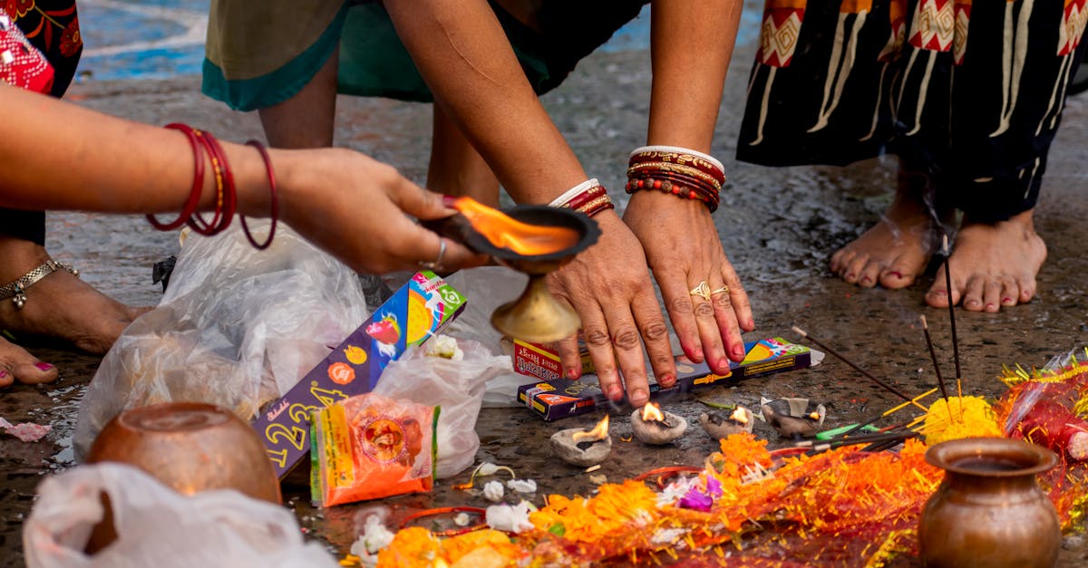 Colorful Hindu ritual ceremony during Ganga Puja in Kolkata, India, highlighting vibrant traditions.