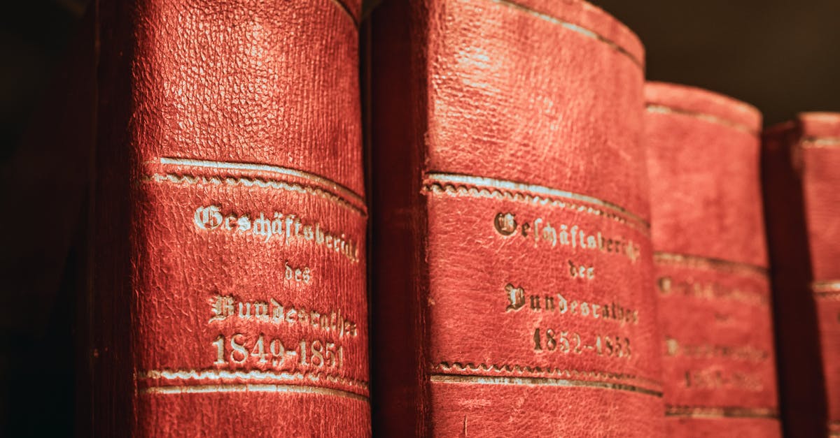 Red leather-bound parliamentary books from 19th century in Bern library, Switzerland.