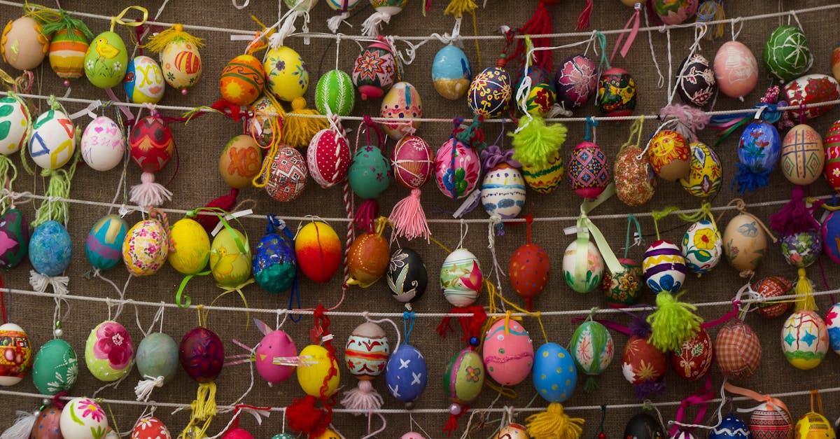 Vibrant collection of intricately decorated Ukrainian Easter eggs on display.