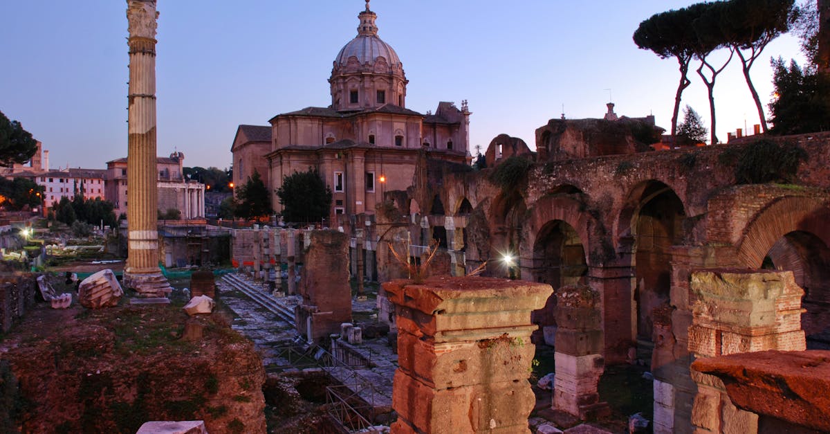 Explore the ancient ruins of Forum Romanum in Rome, Italy during a tranquil twilight.